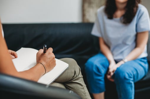 Patient discussing behavioral health with provider