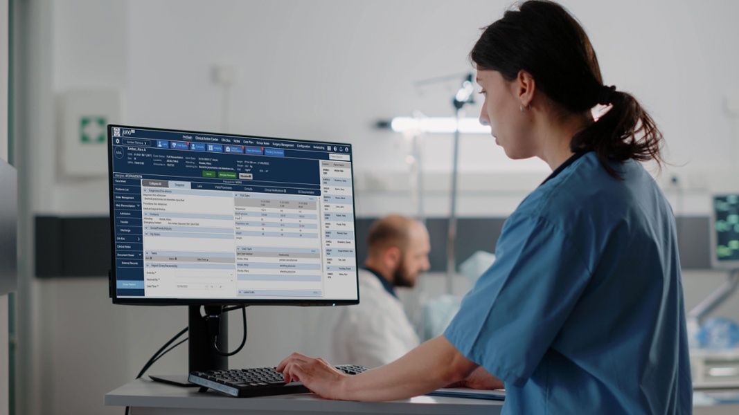 Healthcare worker using an EHR system.