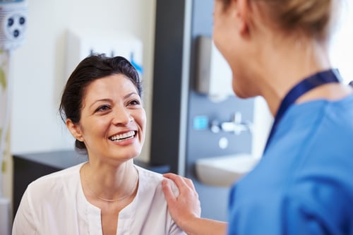 Doctor and patient discussing behavioral health treatment plan. 
