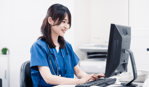 Clinician working successfully with new EHR system