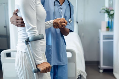 Acute care staff caring for patient