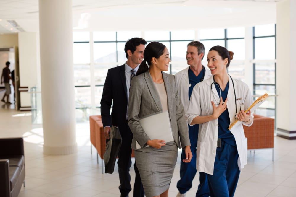 people walking in an office